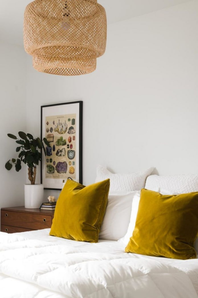 mustard pillows in the bedroom