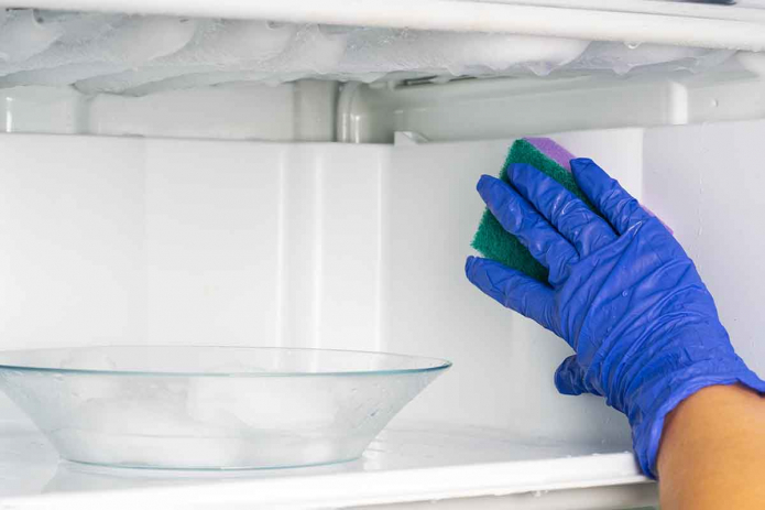 ล้างตู้เย็นหลังจากละลายน้ำแข็ง