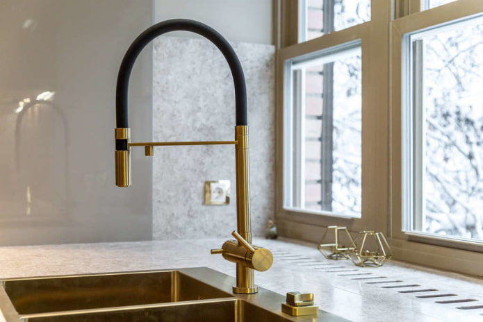 black faucet with gold