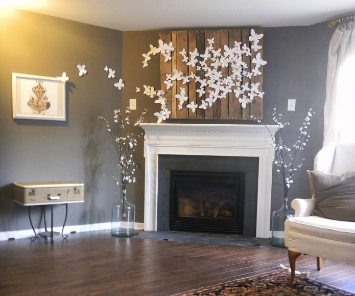 paper butterflies over the fireplace