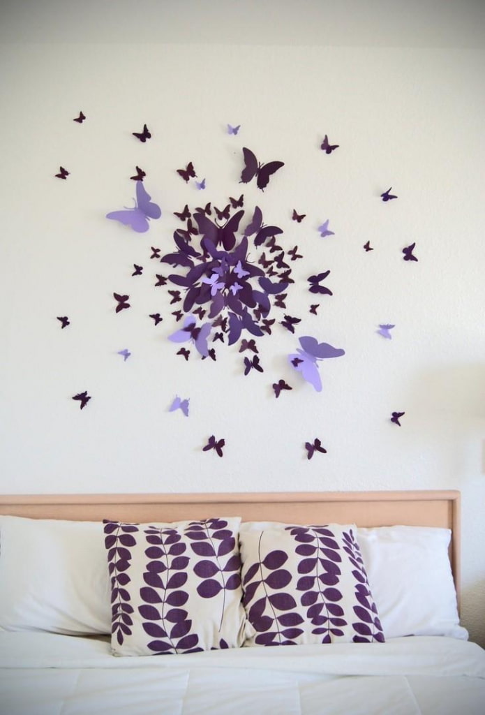 paper butterflies over the bed