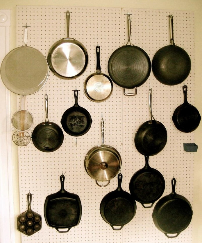 Pans on a perforated board