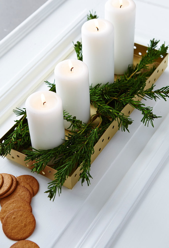 Candles with fir branches