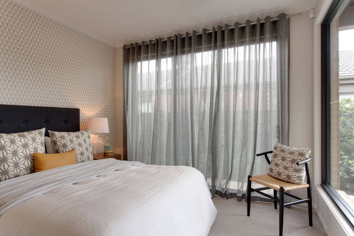 curtains in the bedroom with panoramic windows
