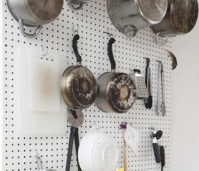 pans on a pegboard
