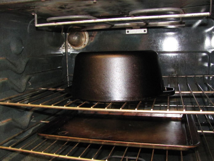 pots are stacked in the oven