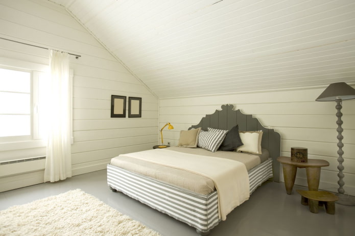 upholstery of the bedroom with white clapboard