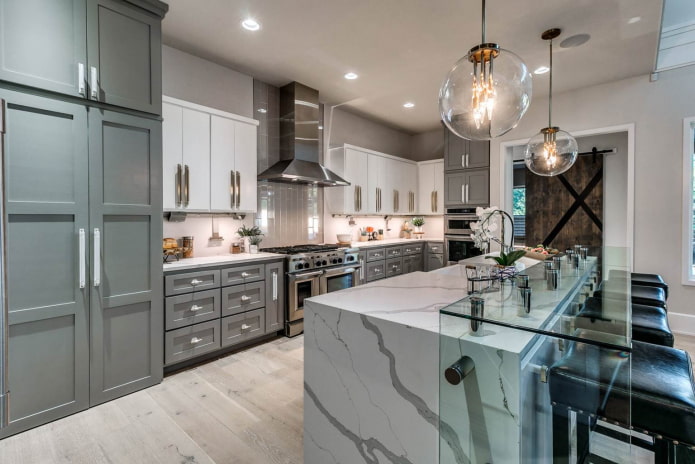 glass and metal elements in gray and white kitchen