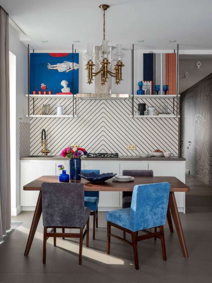 blue and red accents in a gray and white kitchen