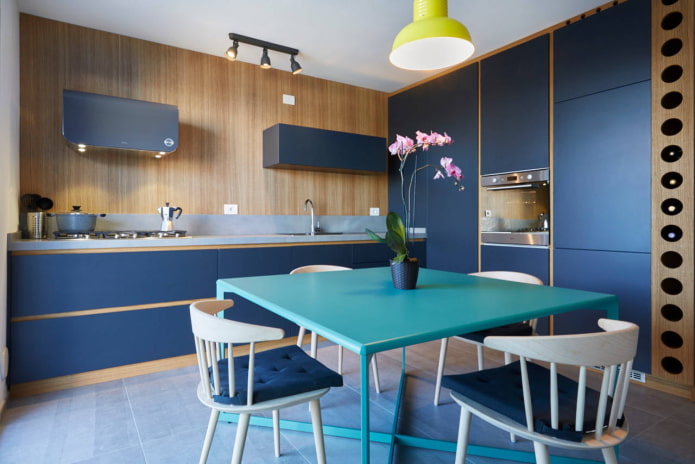 blue kitchen with wood