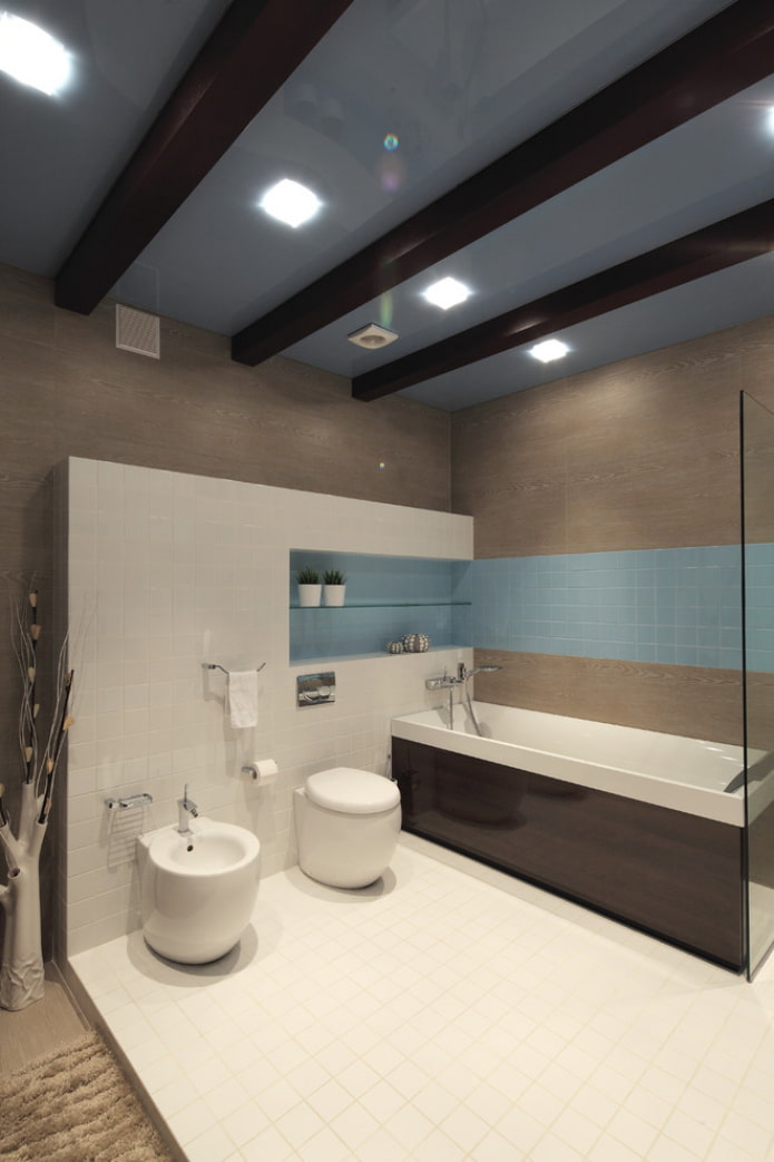 stretch ceiling with beams in the bathroom