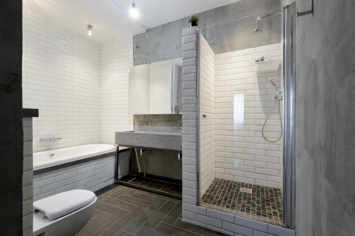 combination of tiles and concrete in the bathroom