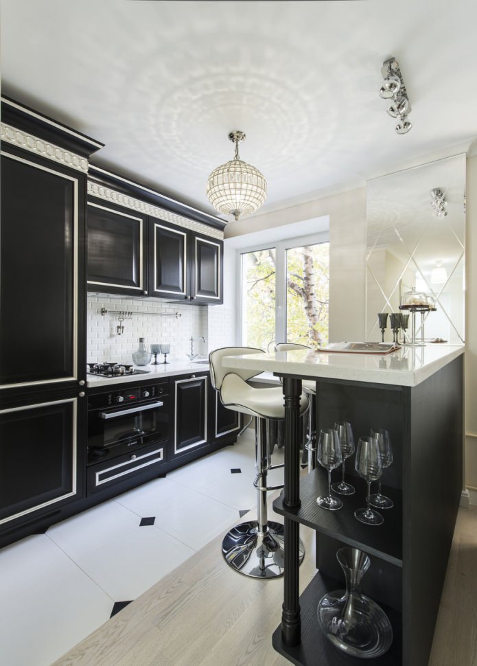 kitchen with a black suite and light walls