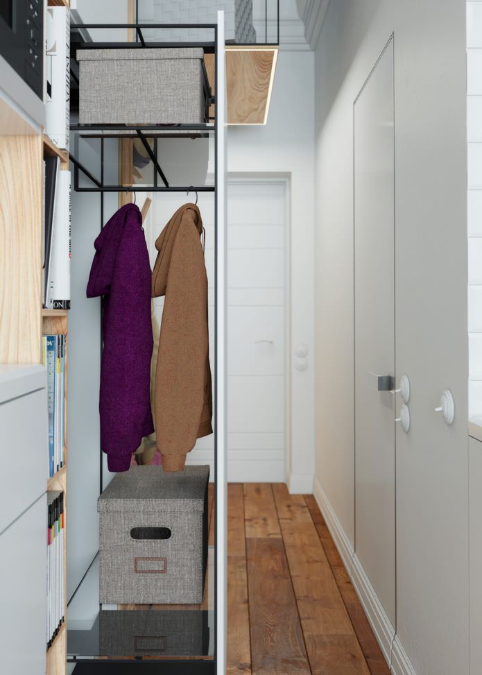 pull-out wardrobe in the interior of the apartment of 15 sq. m.