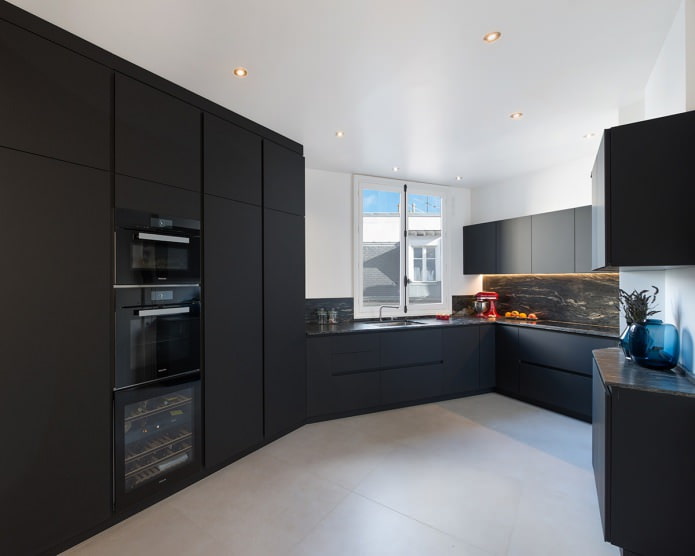kitchen design with a black headset in the style of minimalism