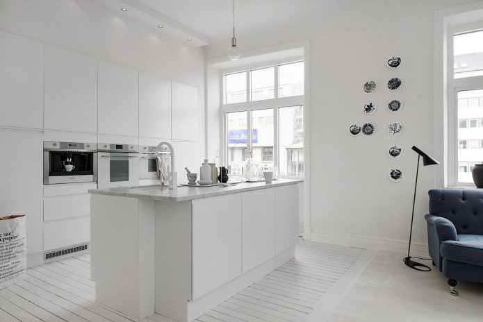 white walls and floor in the kitchen