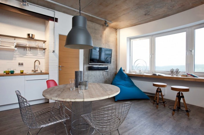bright loft-style apartment with concrete walls