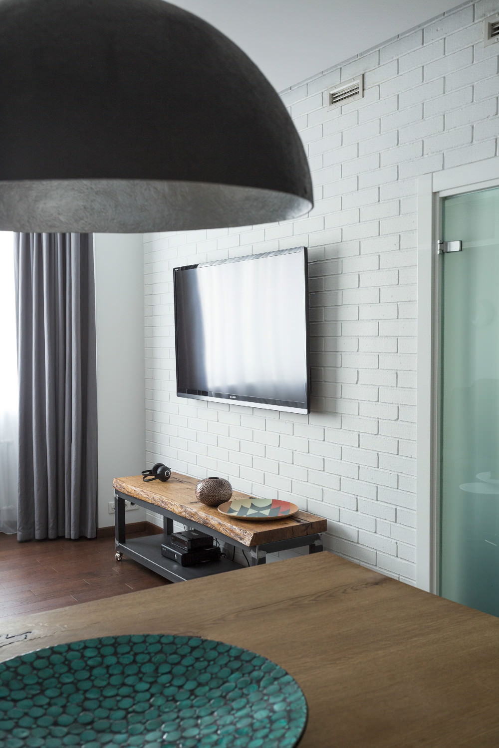 TV in the design of a two-room apartment of 43 sq. m.