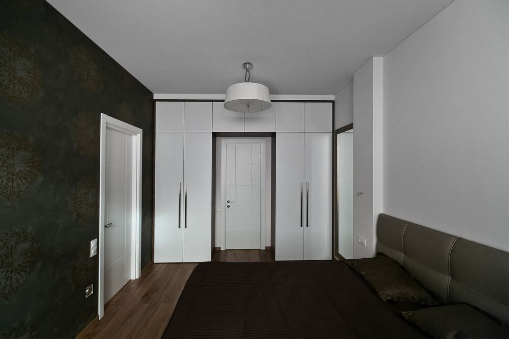 bedroom in the design of an apartment of 64 sq. m.