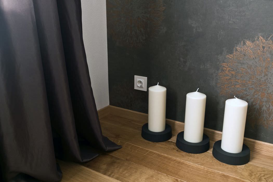 candles in the design of an apartment of 64 sq. m.