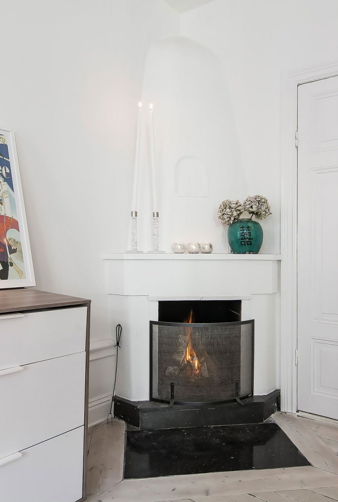 fireplace in the Swedish interior of a studio apartment 34 sq. m.