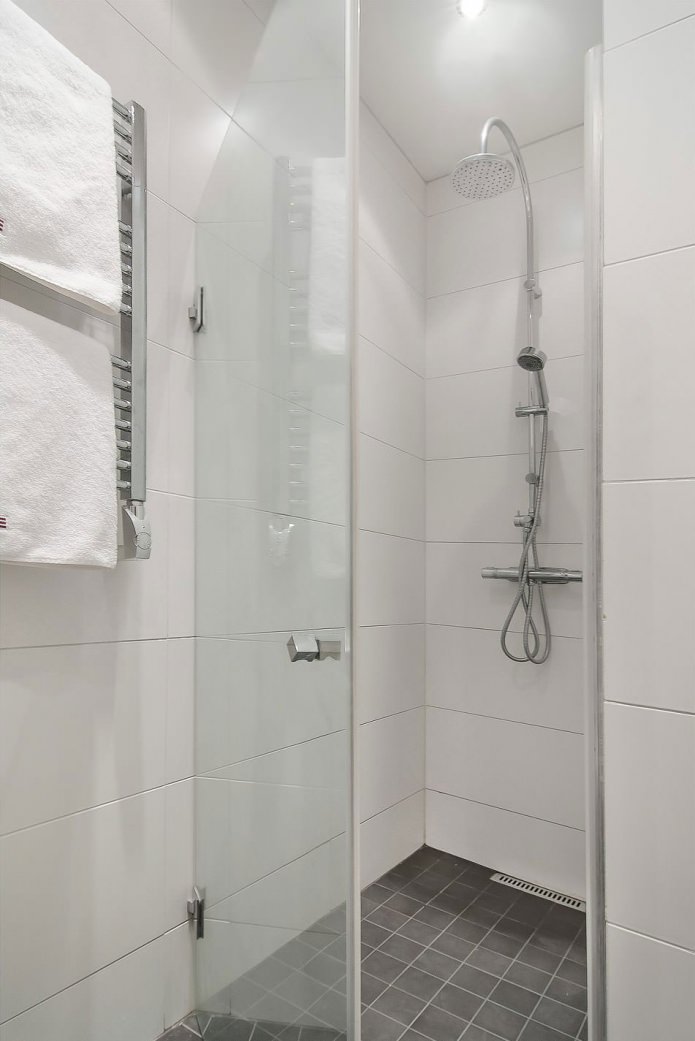 shower cabin in the Swedish interior of a studio apartment 34 sq. m.
