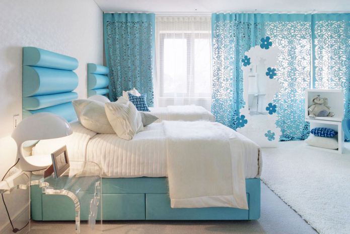 white and blue color in the interior of the bedroom