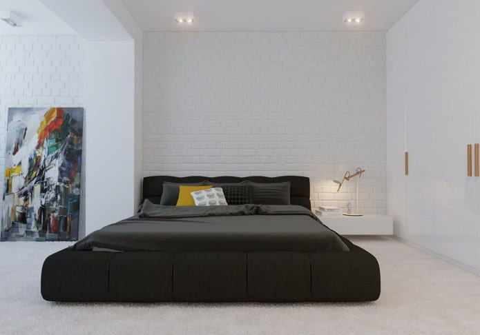 white brick wall in the bedroom