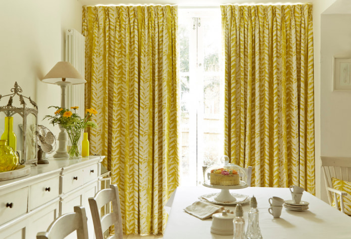 Yellow curtains in the interior: types, fabrics, color, design, decor, combination with the color of the wallpaper