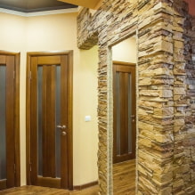 Arch made of stone: finishing options, types, design, color, photo in the interior-0