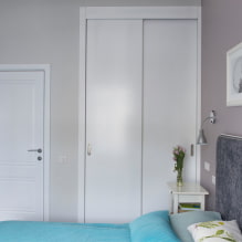 Sliding wardrobe in the bedroom: design, filling options, colors, shapes, location in the room-1