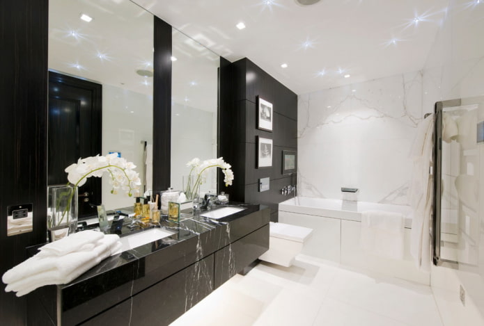 Black and white bathroom: choice of finishes, plumbing, furniture, toilet decoration