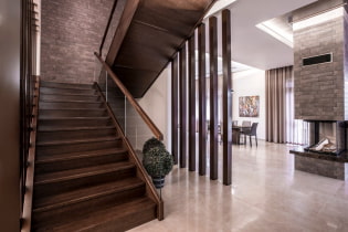Staircase to the second floor in a private house: types, shapes, materials, finishes, colors, styles