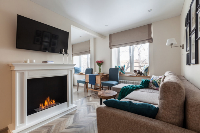 Living room interior with fireplace: photos of the best solutions